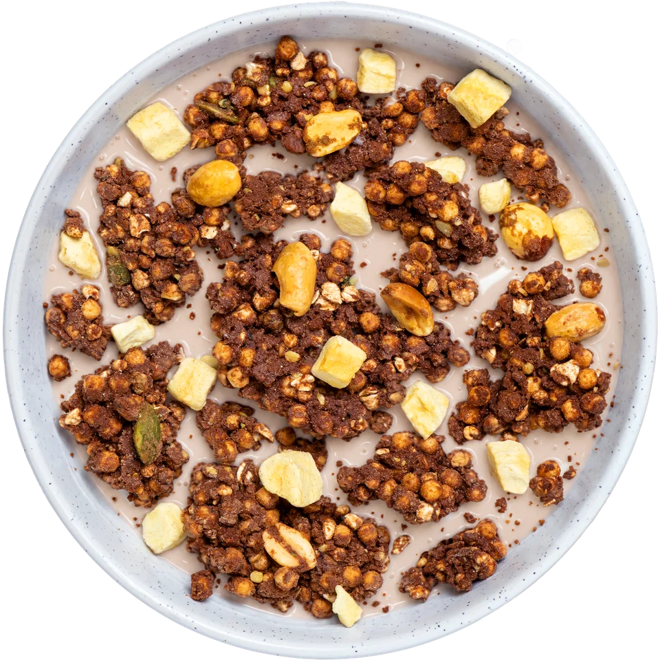 Authentic Chocolate Peanut Banana macronova granola served in a bowl with milk