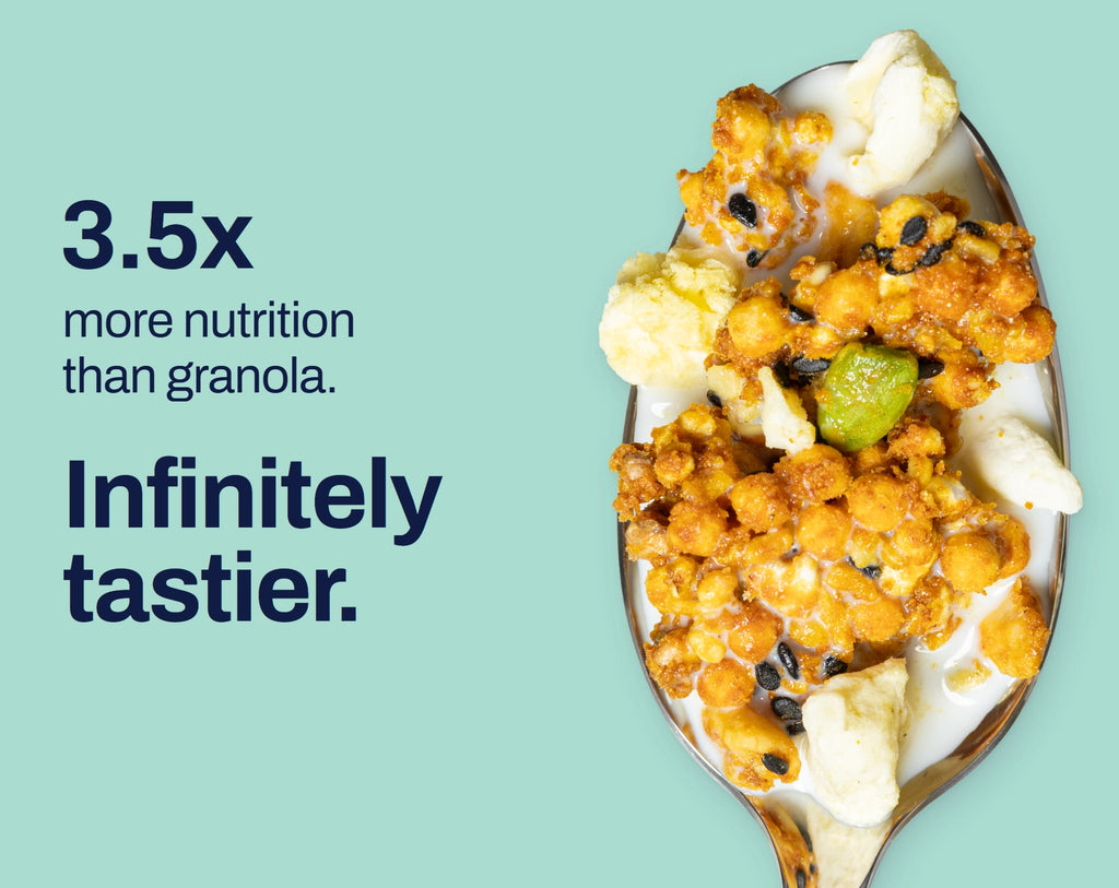 Pineapple Mango granola on a spoon. 3.5x more nutrition than granola. Infinitely tastier.