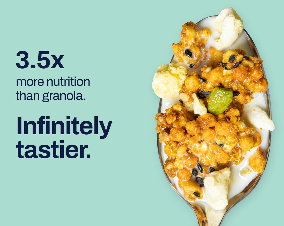 Pineapple Mango granola on a spoon. 3.5x more nutrition than granola. Infinitely tastier.
